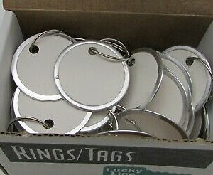 28200 – Key Tag, 1-1/4″ Diameter, Anodized Metal Rim, Paper, White, With 5/8″ Overlapping Ring, For Price Tag/Product Identification Tag, 50 Each Per Display Box (List 19.50)